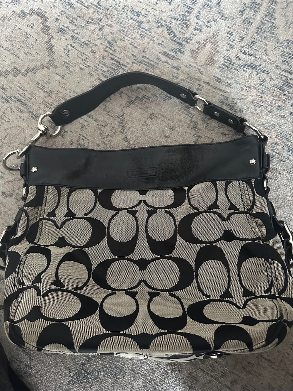 Vintage Coach Zoe Hobo Bag in the iconic interlocking "C" signature monogram
